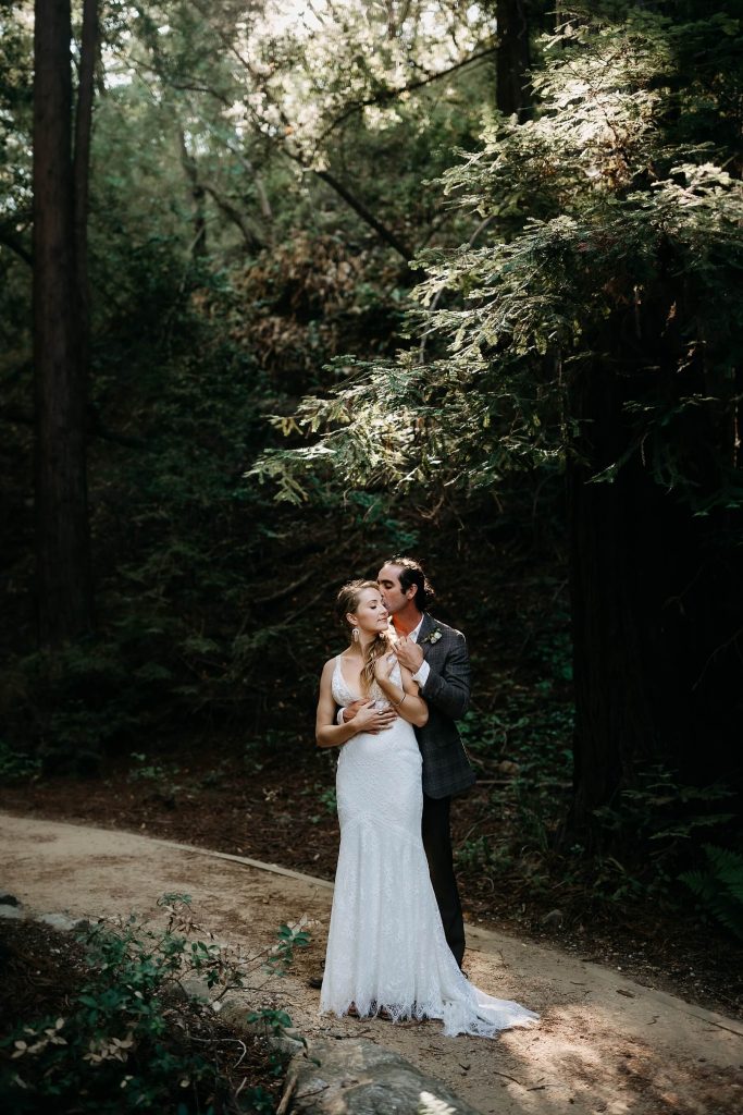 portraits of bride and groom in redwoods near big sur lodge